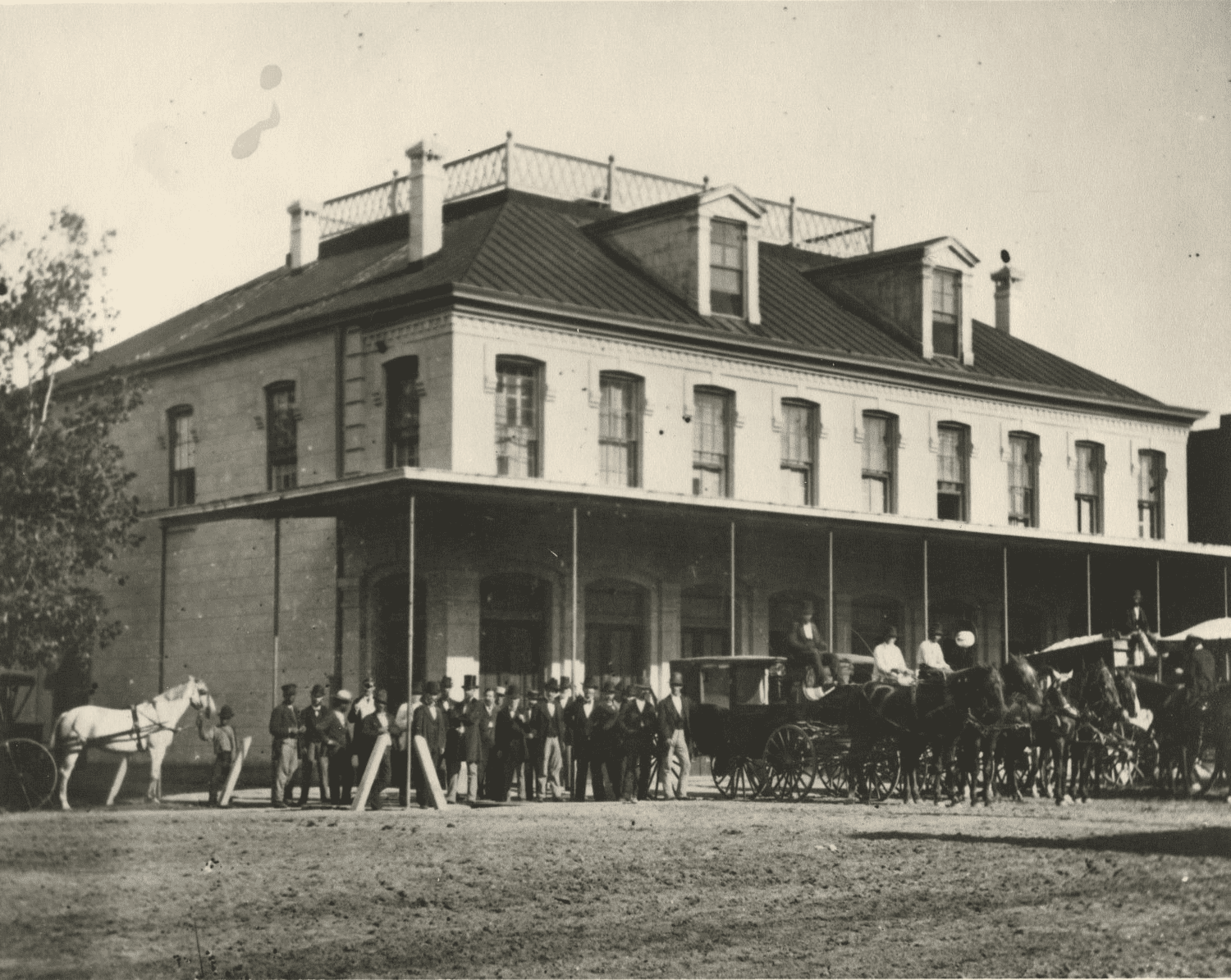 A historical photograph or drawing of the original Capitol building in Houston.