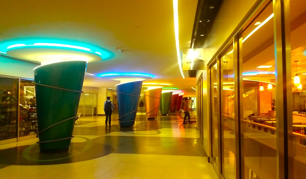 A modern, but eerily lit hallway in the Houston tunnel system.